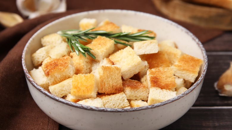 bowl of croutons with fresh rosemary