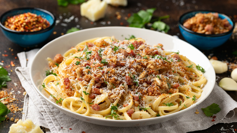 pasta garnished with breadcrumbs