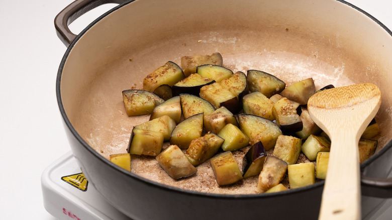 eggplant frying in pan