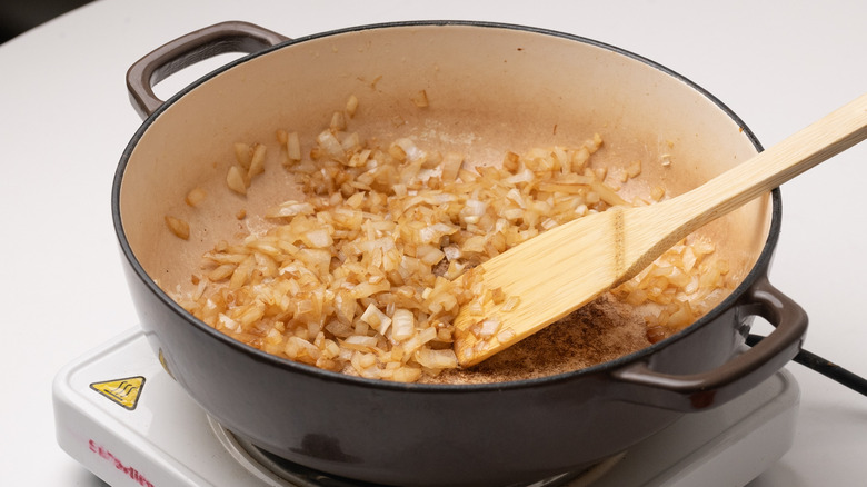 pan frying onion and garlic