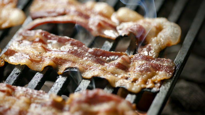 Bacon on charcoal grill