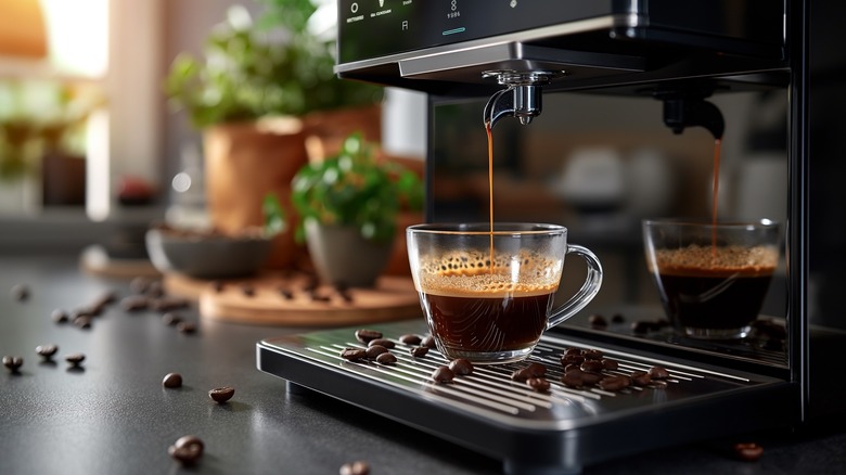 espresso machine dripping espresso into cup