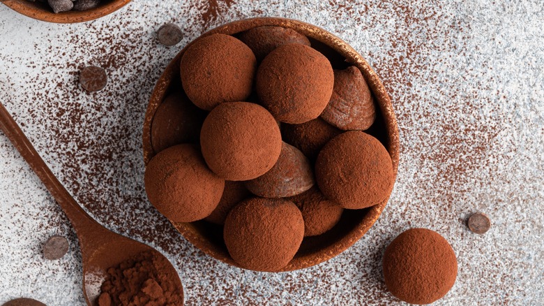 a bowl of chocolate truffles