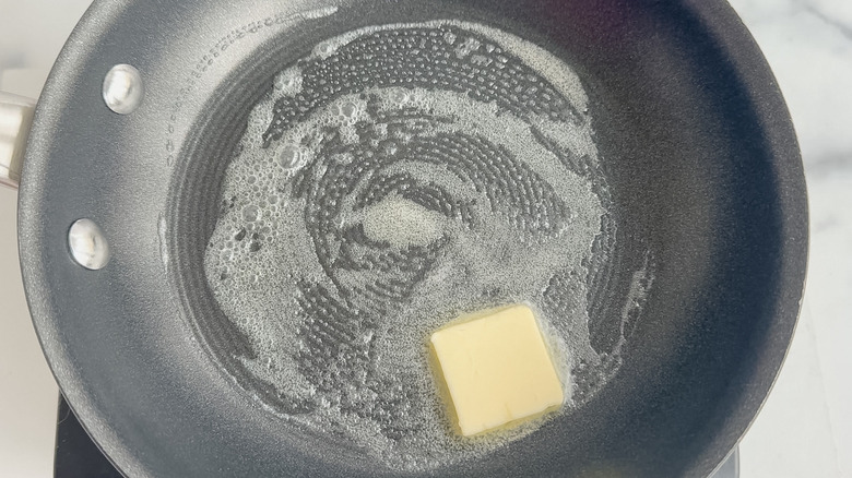 butter melting in hot pan