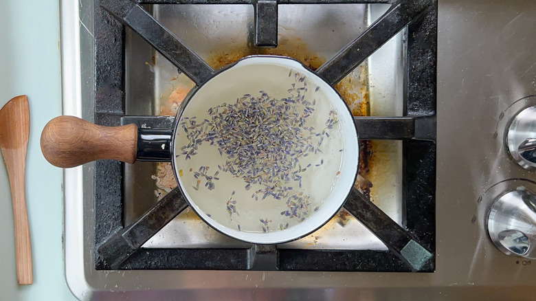 Sugar, water, and dried lavender in saucepan