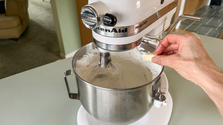 Adding butter to whipped egg whites in stand mixer