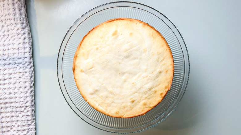 Bright and sunny lemon lavender cake layer on serving platter