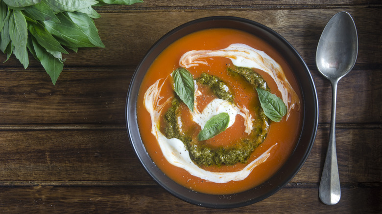 Tomato soup pesto herb garnishing