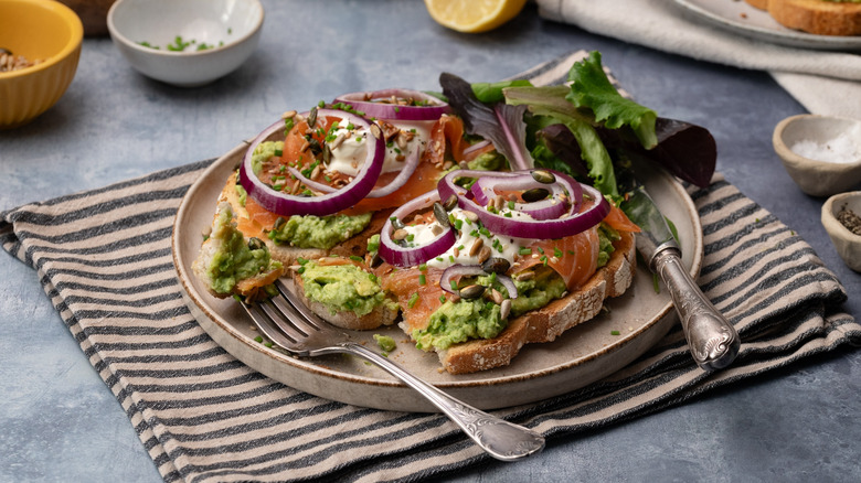 smoked salmon avocado toast served on plate