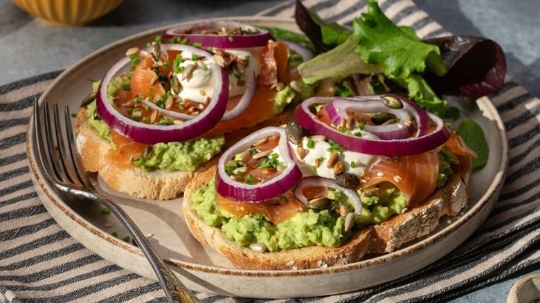 smoked salmon avocado toast served on plate