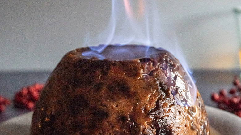 christmas pudding with flaming brandy