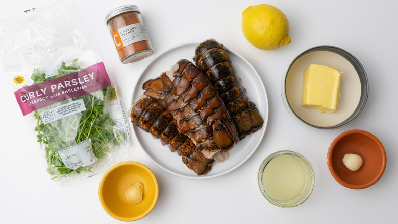 ingredients for lobster tails on a table