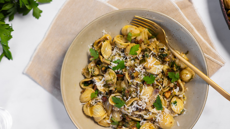 orecchiette pasta with parmesan and parsley in bowl