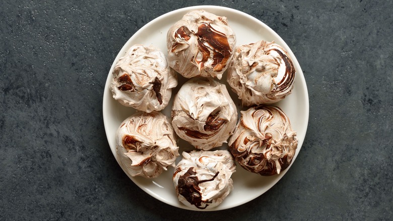 plate of chocolate meringues