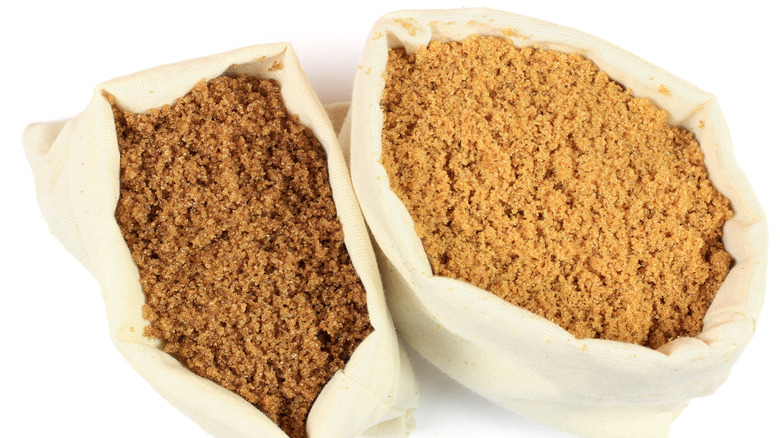 Light and dark brown sugar in sacks 