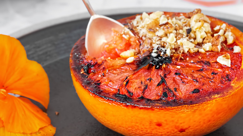 caramelized grapefruit topped with nuts