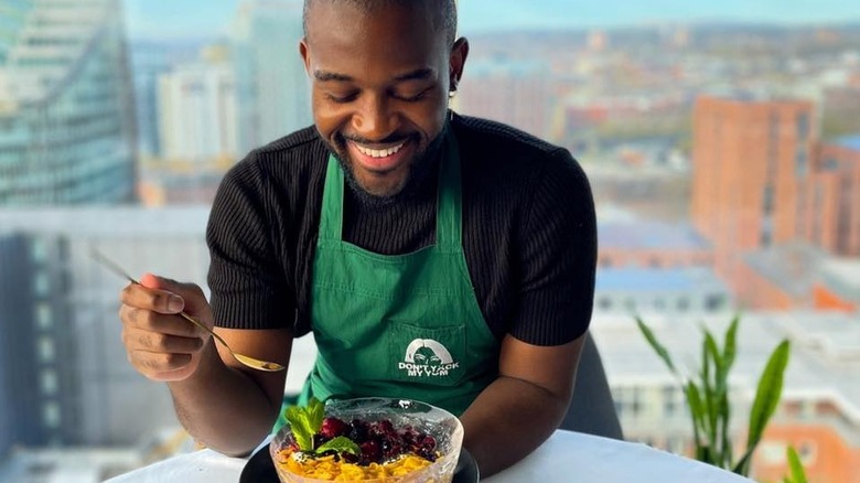 Nigel Kabvina eating breakfast