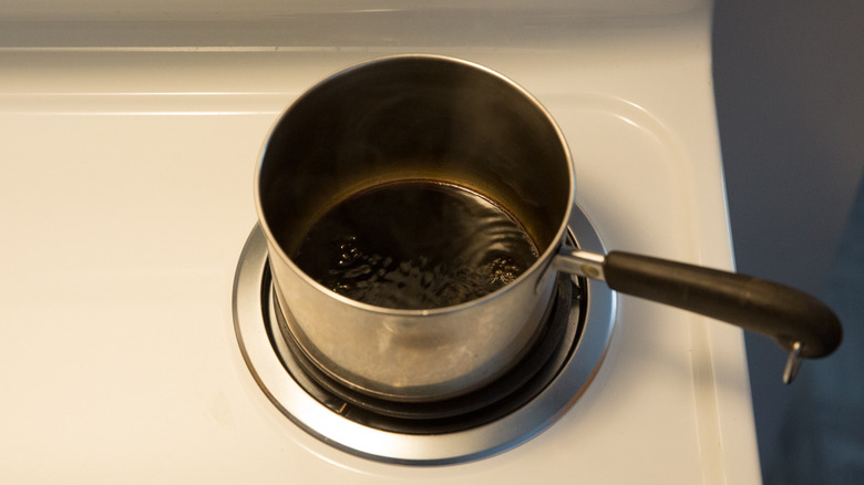 balsamic vinegar simmering in pan