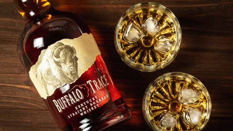 Bottle of Buffalo Trace whiskey and two glasses