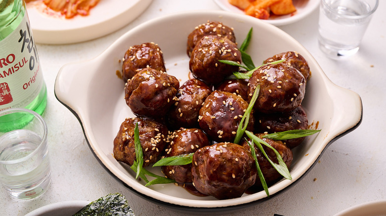 meatballs garnished with sesame seeds