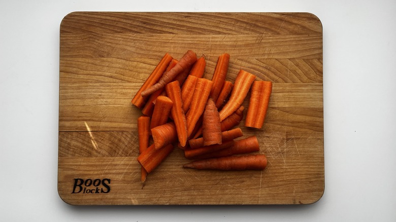 chopped raw carrots on board