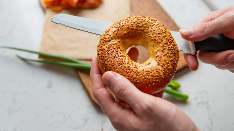 slicing a bagel