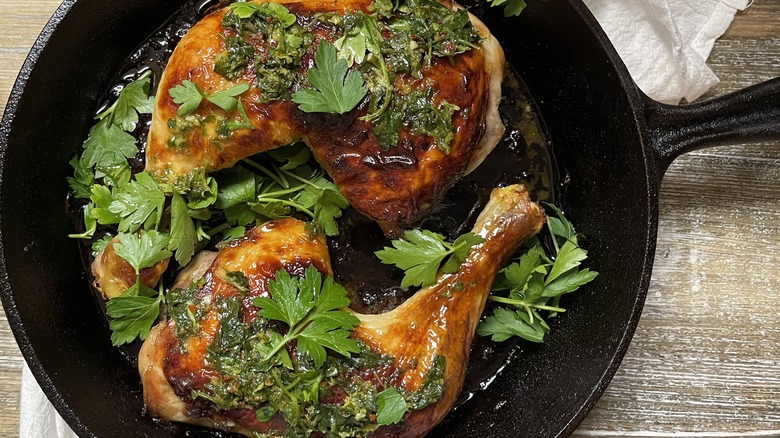 chicken and parsley in pan