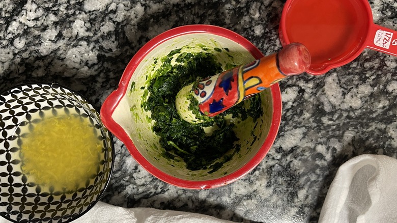 mashed parsley in mortar