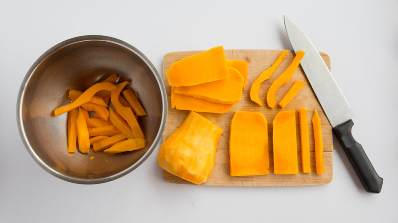 sliced butternut squash on board