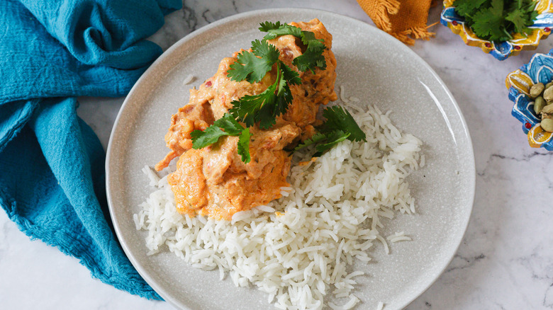 Plate with rice and kofta with cilantro