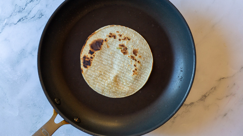 toasted tortilla on pan