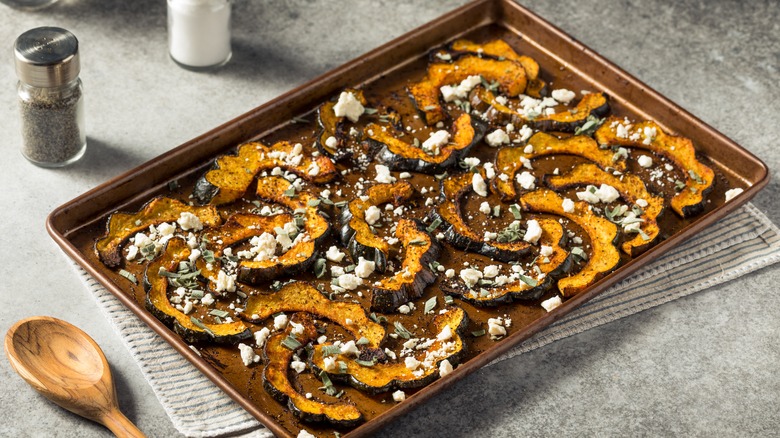 Roasted acorn squash skins in a pan