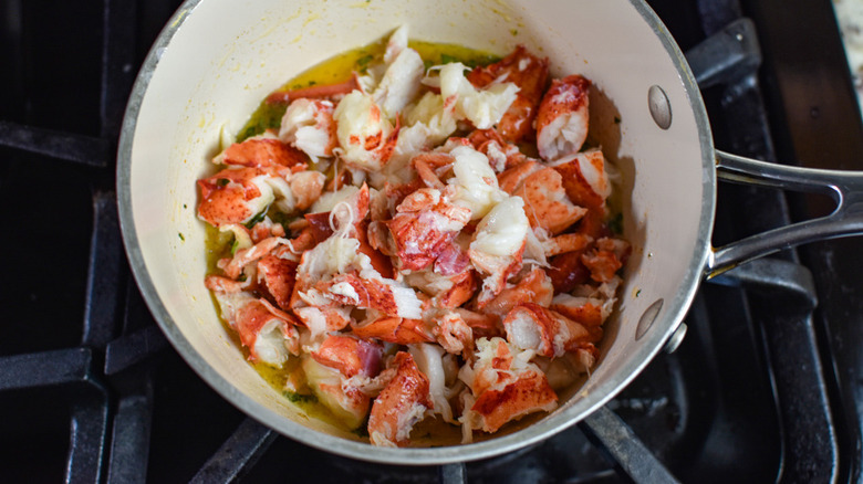 lobster with butter on stove