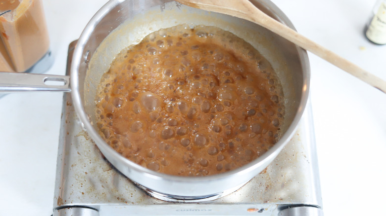 caramel sauce bubbling in pan