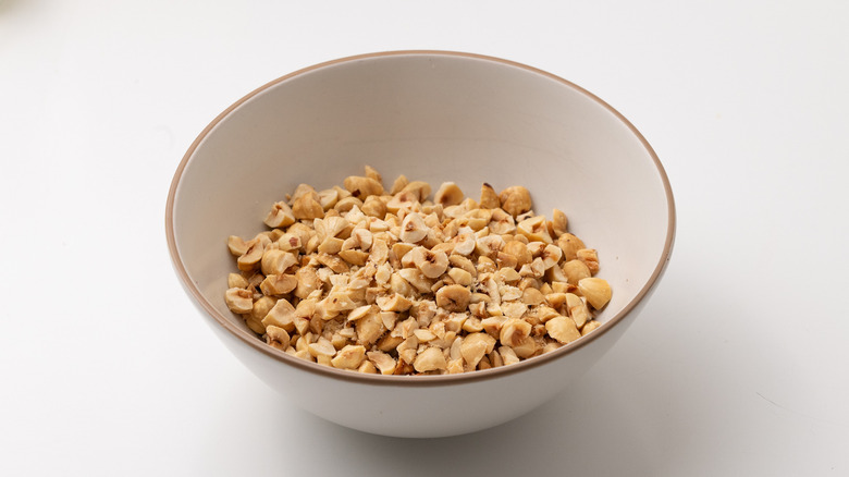 Chopped hazelnuts in a bowl 