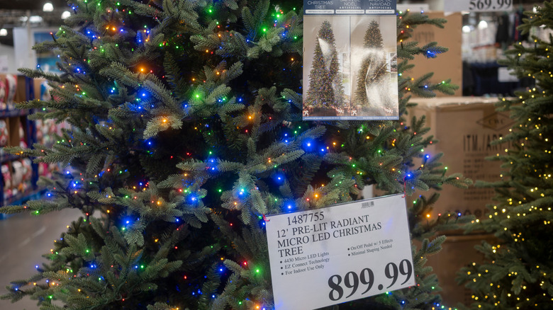 Decorated Christmas tree at Costco with price tag