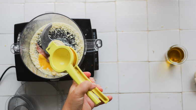 Juicing lemon into food processor