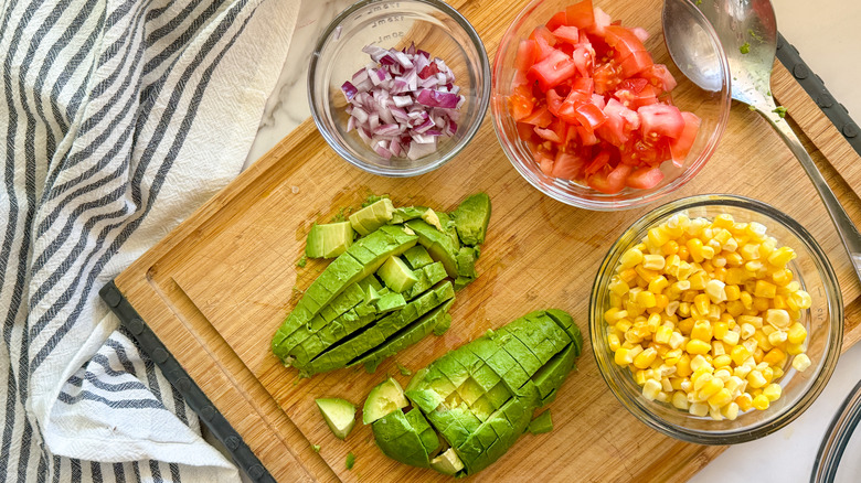 chopped vegetables on board