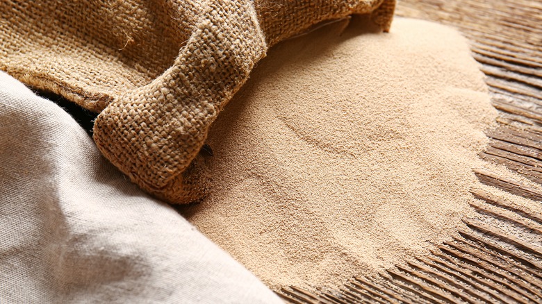 Dry yeast and burlap sack