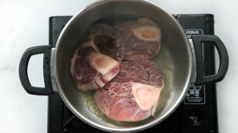 beef shank searing in pot