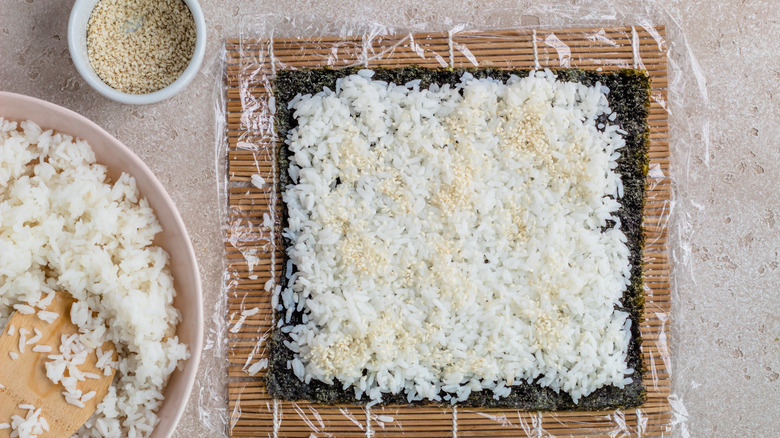 nori sheet topped with rice
