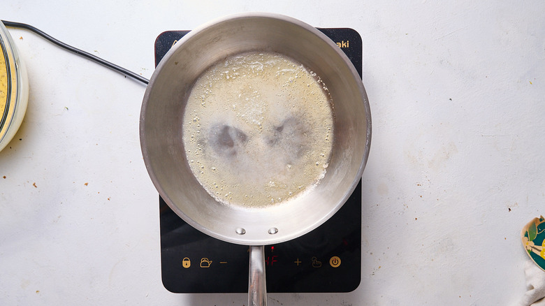 melting butter in skillet