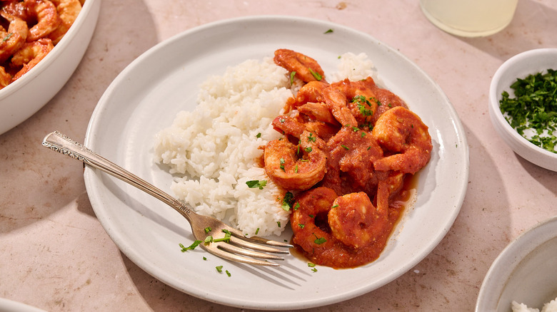 shrimp in red sauce on plate