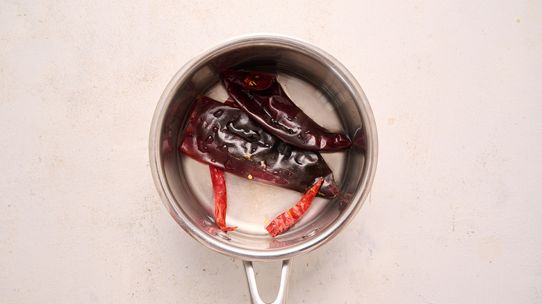 boiling chiles in saucepan