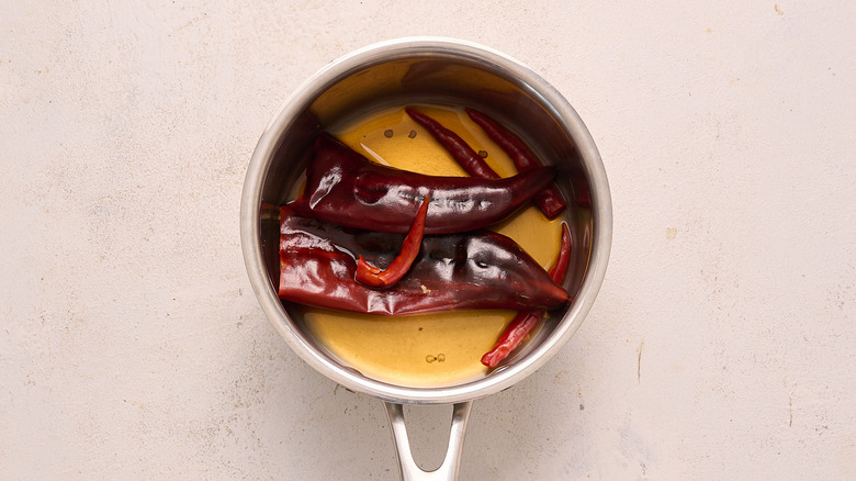 softened chiles in saucepan