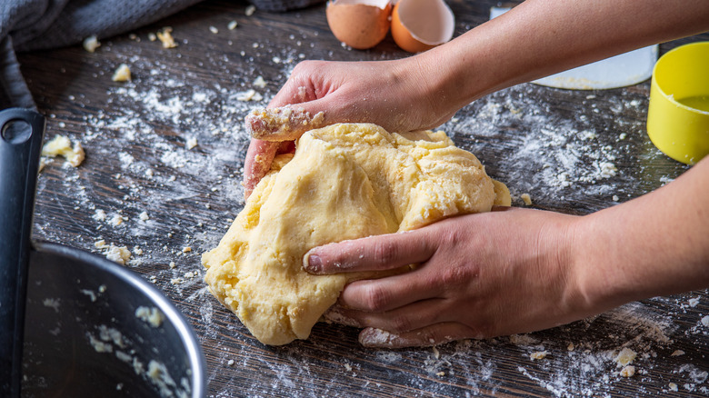 kneading gnocchi dough 