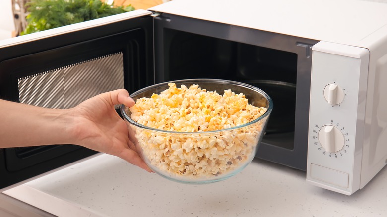 Bowl of microwave coming out of a microwave