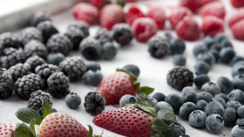 frozen fruit pieces on a baking sheet