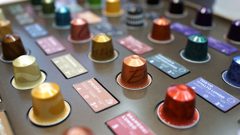 various Nespresso pod flavors on display at store