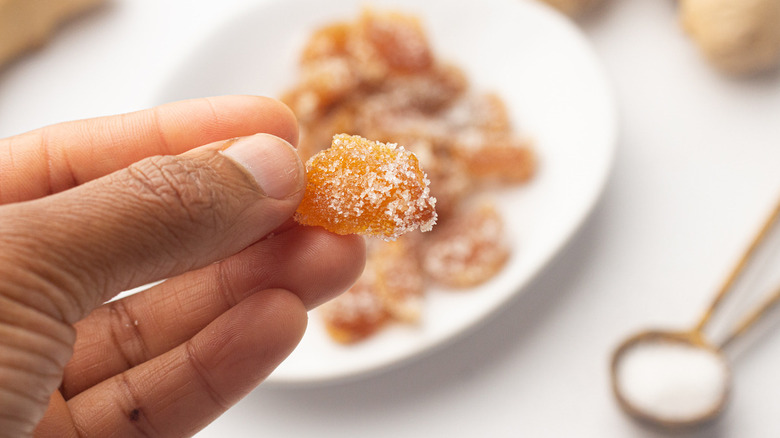 hand holding candied ginger